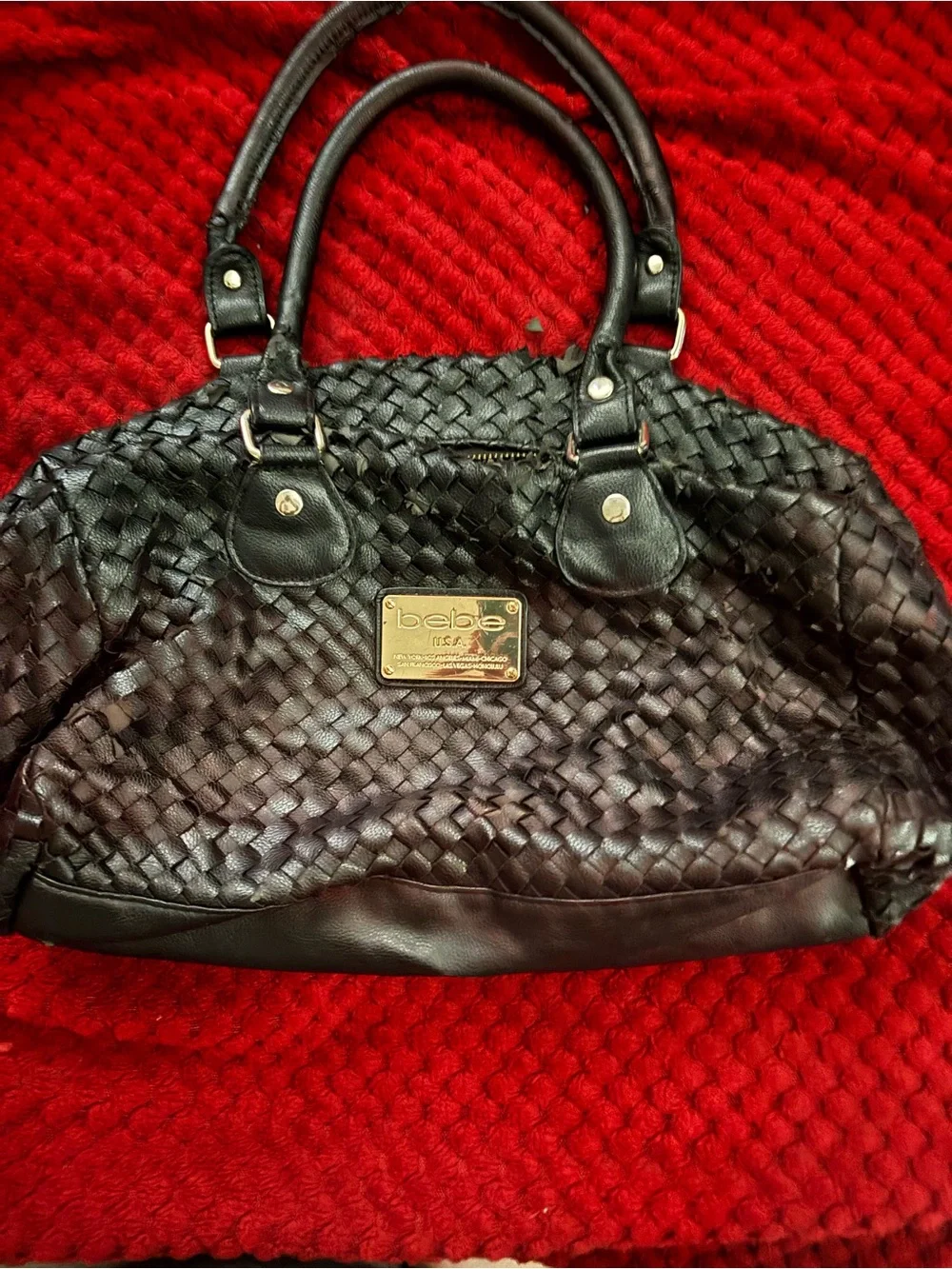 bebe Black Woven Leather Satchel with Gold Plaque